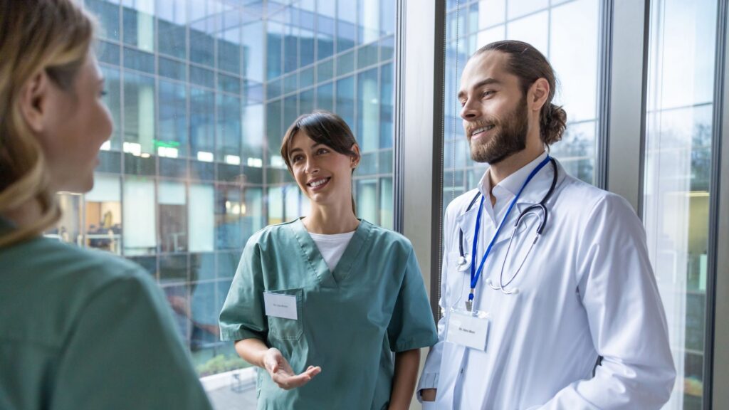 Group of doctors discussing something and looking excited and interested