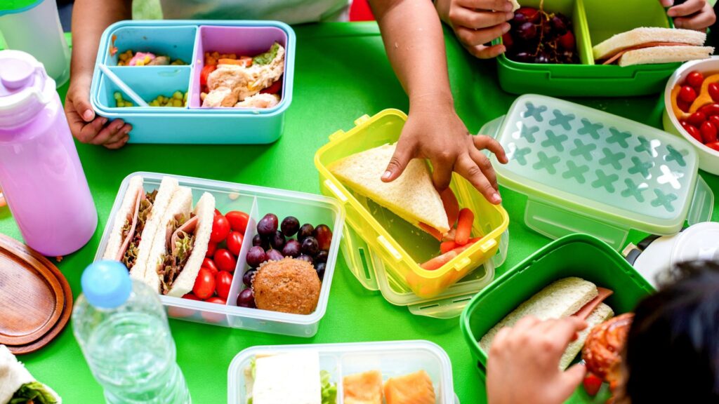 Children eating on their lunchboxes