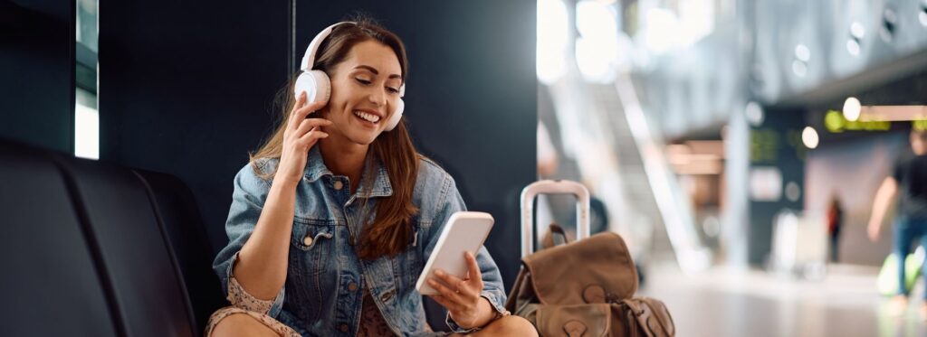 Woman smiling using phone