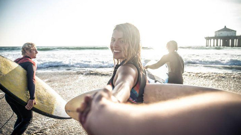 Surfing on the beach