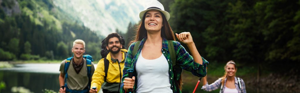 woman leading a team of hikers