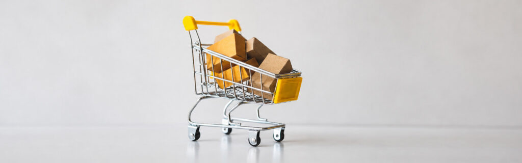 mini shopping cart with boxes of shopping