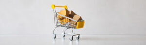 mini shopping cart with boxes of shopping