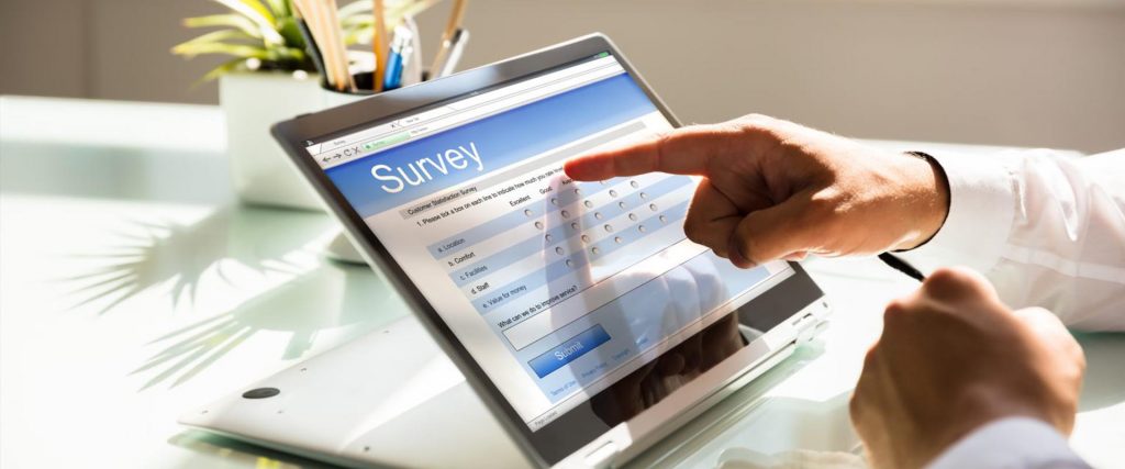 Person completing online survey for investments