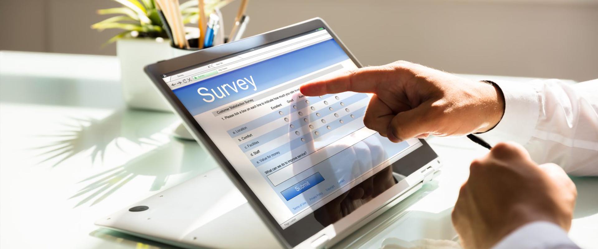 Person completing online survey for investments