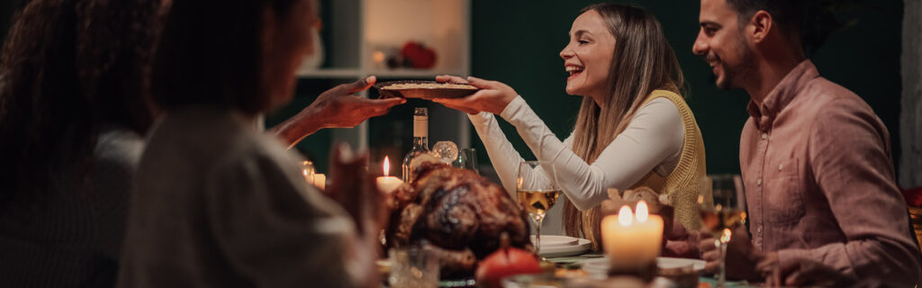 Group of friends and family at Thanksgiving dinner