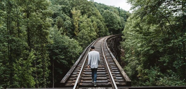 walking on train tracks
