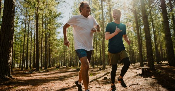 Grandpa Grandson running in the forest