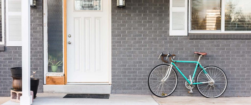 Parcel Pirate - Front porch with parked bike