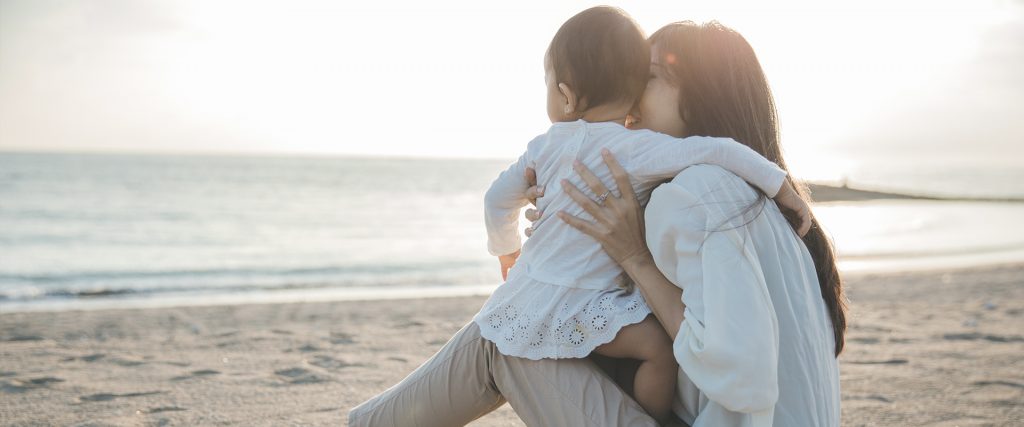 Mother and child at the beach