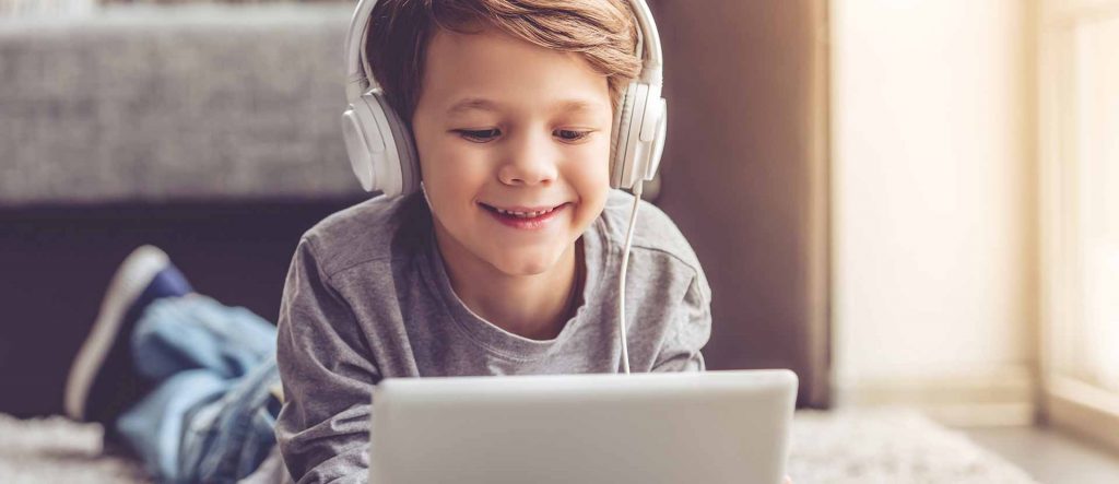 Young kid watching on a tablet device