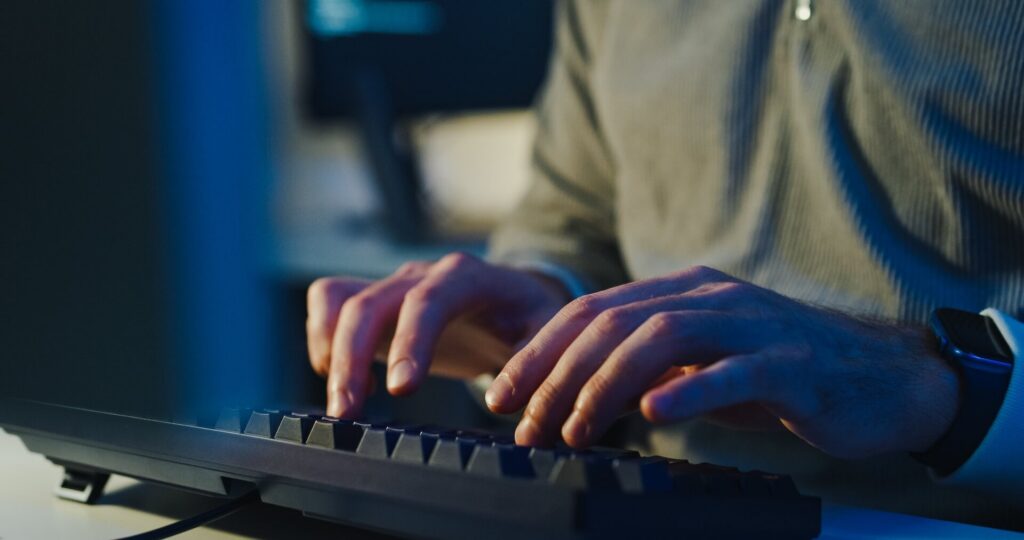 Typing write prompt AI bot app program nomad terminal coding at office night